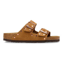 Brown sandal with cork sole on a white background