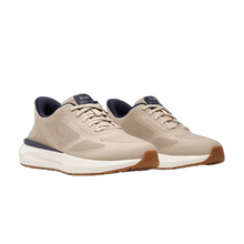 Pair of tan mens sneakers 