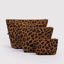 Three leopard-print pouches in different sizes