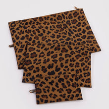 Three leopard print zippered pouches in different sizes
