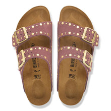 Pair of pink suede sandals with gold buckles 