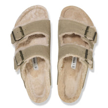 Pair of beige sandals with shearling lining 