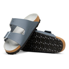 Pair of gray sandals with cork sole on a white background