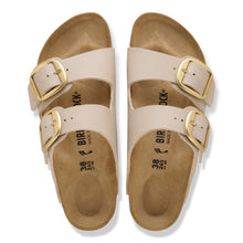 Beige sandals with gold buckles 
