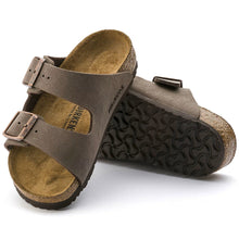 Pair of brown sandals with buckles