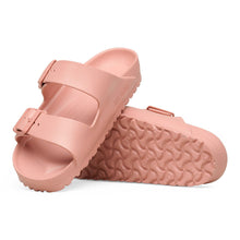 Pair of pink Birkenstock sandals with textured sole