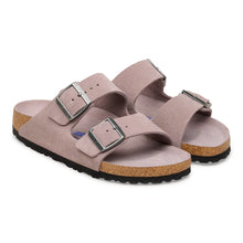 Pair of double strapped light purple sandals with cork soles 
