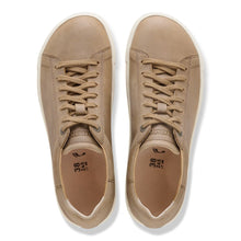 Pair of beige leather sneakers