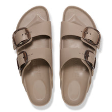 Pair of birkenstock eva beige sandals with buckles