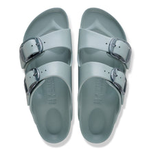 Pair of light green sandals with buckles 