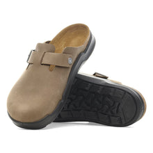 Brown leather men's clogs with black rugged soles 