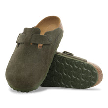 Pair of green suede clogs 