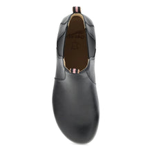 A black leather Dansko slip-on boot 