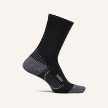 Black and gray sock with 'Feetures' branding