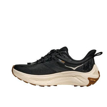 Hoka One One Women's Transport 2 - Black/Alabaster walking sneaker elastic lace inside profile 