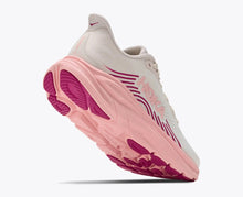 Women's Hoka pink and white running sneaker 