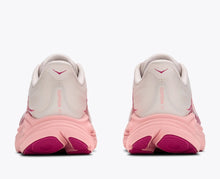 Pink and white running shoes