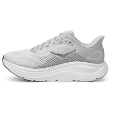 Women's light gray and white athletic sneaker shown from the side 