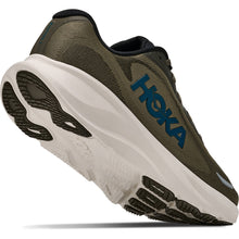 A Hoka running shoe in olive green and white