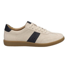 beige sneaker with black stripe 