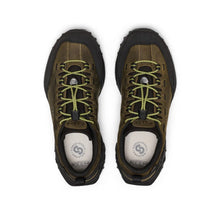 A pair of Keen hiking featuring an olive green and black suede upper with lime green laces and white insoles.