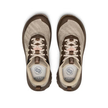 A pair of Keen outdoor sneakers shown from a top view, featuring a beige and brown mesh knit upper with cream laces