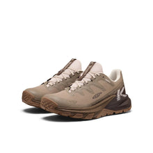 Pair of brown and beige running shoes