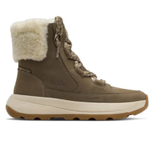 A Kizik winter boot in taupe brown with a cream-colored faux fur collar and a thick beige and brown sole
