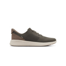 Men's low-top athletic Kizik sneaker, featuring a dark brown knit upper, a brown suede heel tab, and a thick off-white midsole.