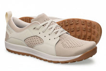 Beige sneakers with brown soles