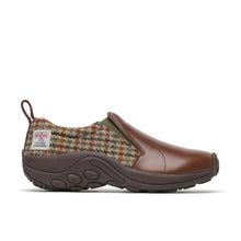 A slip-on shoe featuring a brown leather toe cap, a brown and dark brown houndstooth patterned tweed heel, and a dark brown sole.
