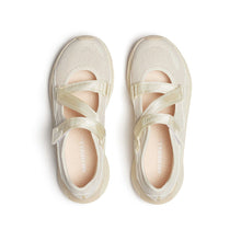 Pair of women's beige Mary Jane shoes with a strap