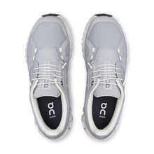 Gray travel shoes with white soles