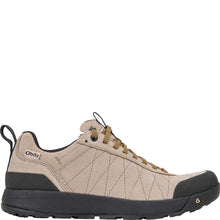 Women's Oboz low-top outdoor hiker in beige suede with brown laces, a black outsole, and black heel and toe caps