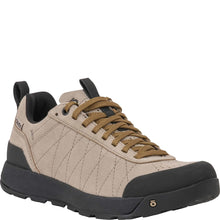 Women's Oboz low-top outdoor hiker in beige suede with brown laces, a black outsole, and black heel and toe caps