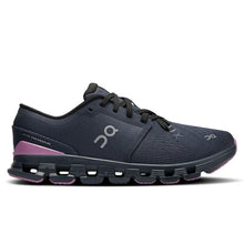 Navy running shoe with pink sole