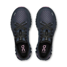 Pair of navy running shoes with pink detailing 