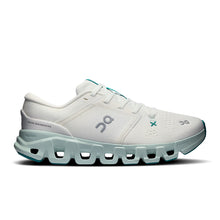A white On Cloud sneaker with a distinctive light blue-green sole and teal accents