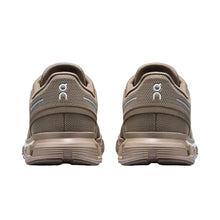 Pair of women's brown running sneakers 