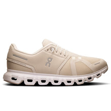 Beige running shoe with white sole