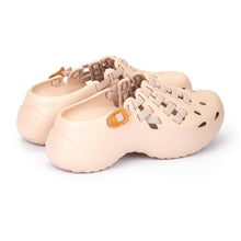 Women's nude clog sandals with woven design and orange accents