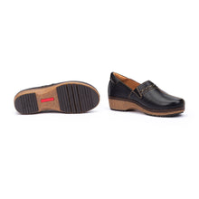 Black leather shoe with brown sole 