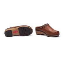 A pair of brown leather clogs, with one clog displaying the sole and the other showing the side.