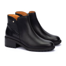 Pair of black leather ankle booties