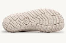 Lems Primal Zen minimalist shoe in Nugget orange side outsole view showing tread and wide toe box 