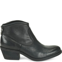 A black leather ankle boot with a low block heel