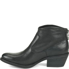 A black leather ankle boot with a low block heel and zipper