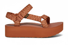 Brown sandal with woven straps