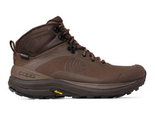A brown mid-cut outdoor hiking boot with a textured synthetic upper, lace-up front, and a rugged black and brown Vibram sole