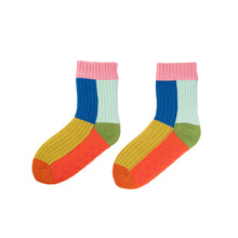 Colorful socks with grips on the sole